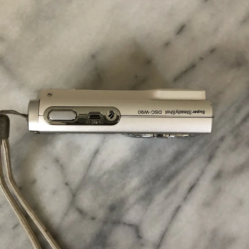 WORKS Sony Silver Cyber-shot Compact Digital Camera with Wrist Strap